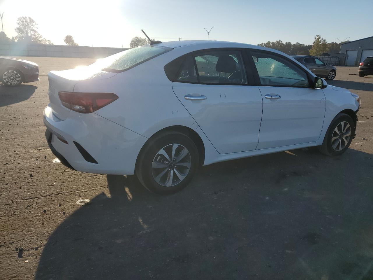 2023 KIA Rio VIN 3KPA24AD2PE612855 Copart auction photo, front end / side damage thumbnail 3
