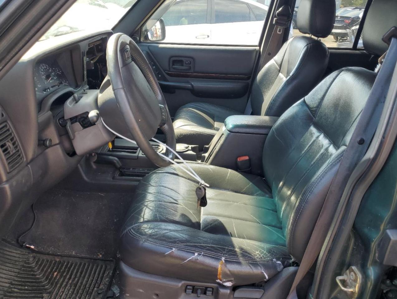 2000 Jeep Grand Cherokee VIN 1J4FF68SXYL135220 Copart auction photo, front end / minor dent/scratches damage thumbnail 7