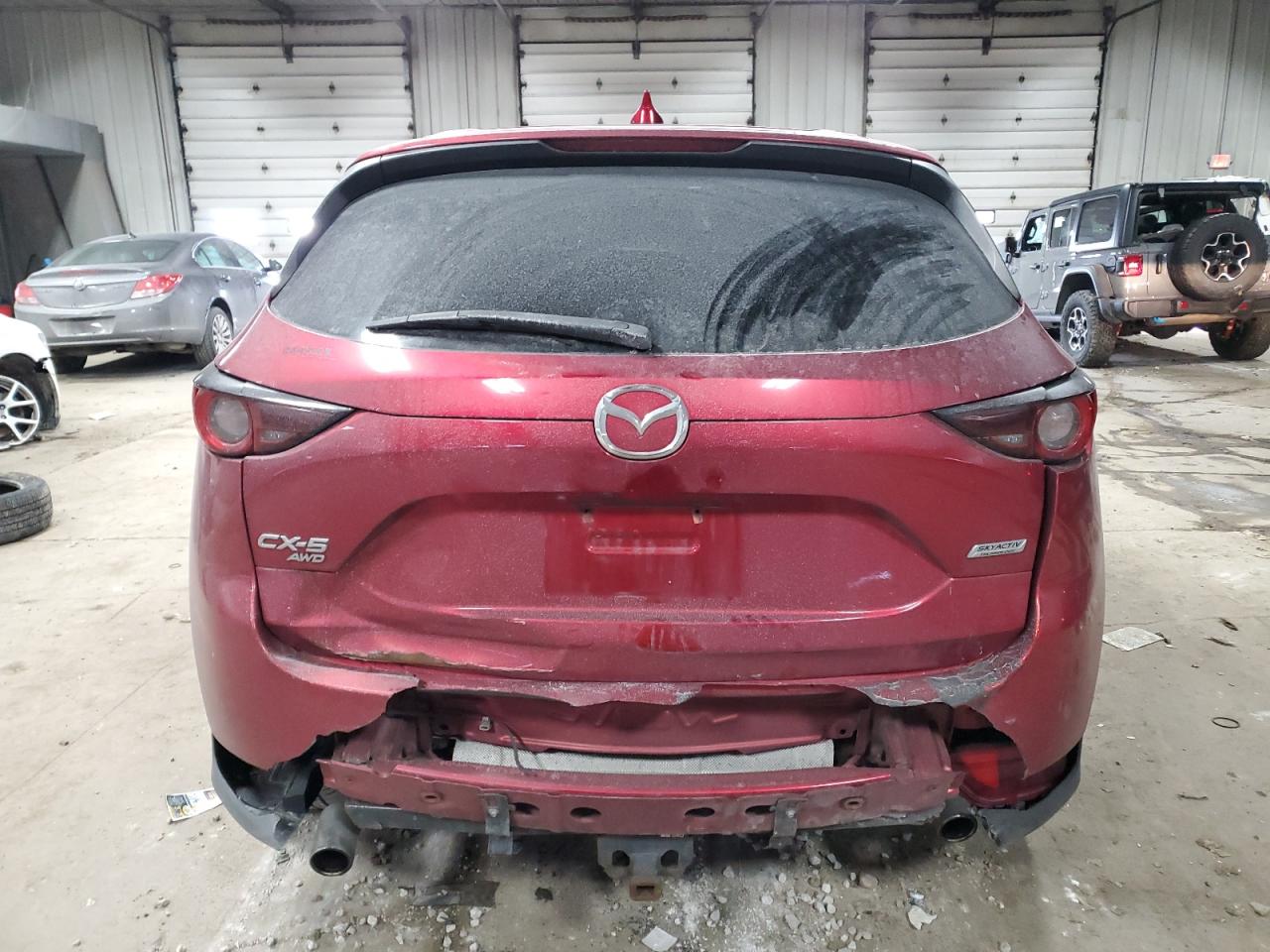 2017 Mazda CX-5 VIN JM3KFBCL8H0167153 Copart auction photo, side / rear end damage thumbnail 6