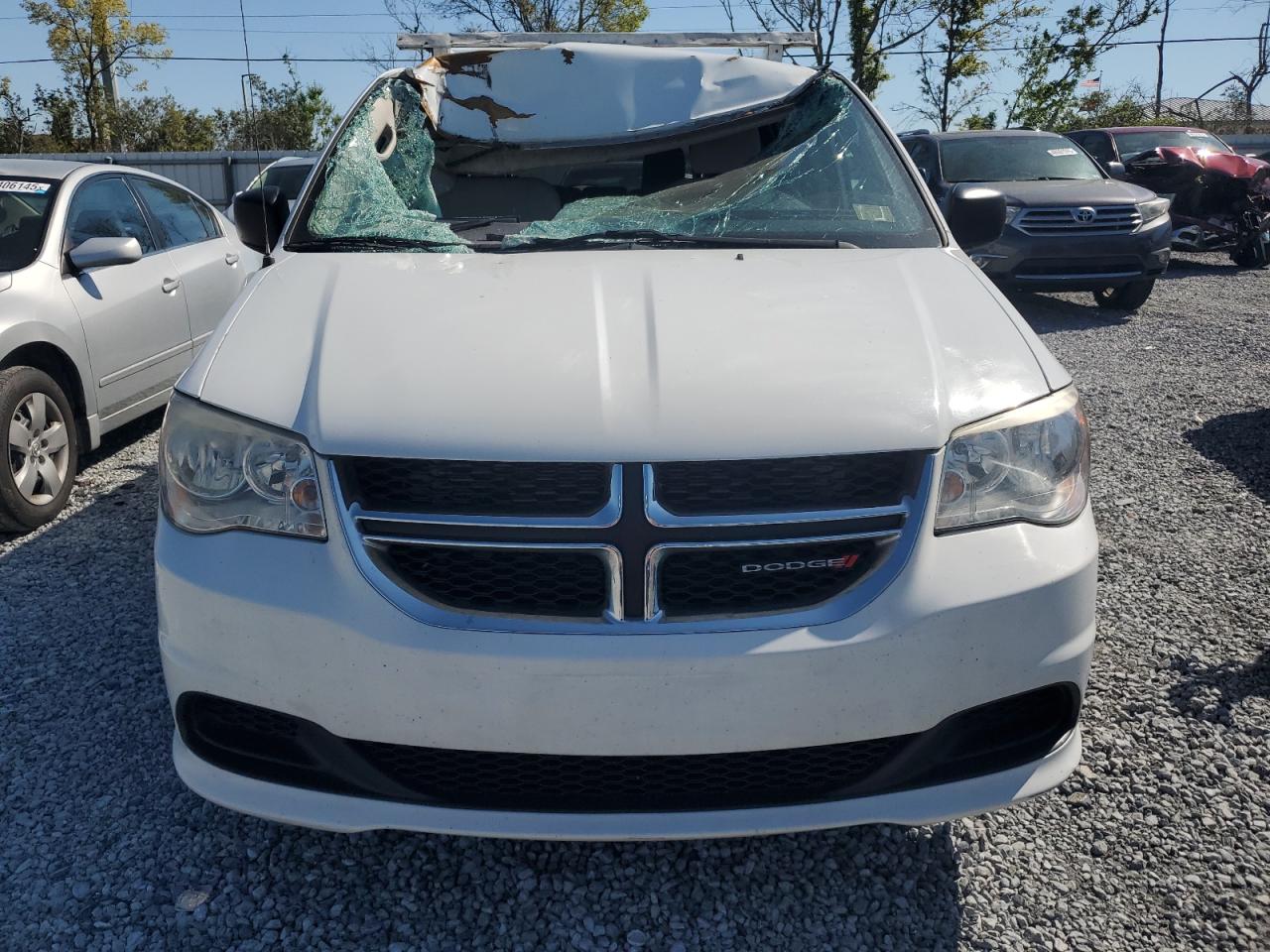 2016 Dodge Caravan VIN 2C4RDGBG4GR285011 Copart auction photo, frame damage / top/roof damage thumbnail 5