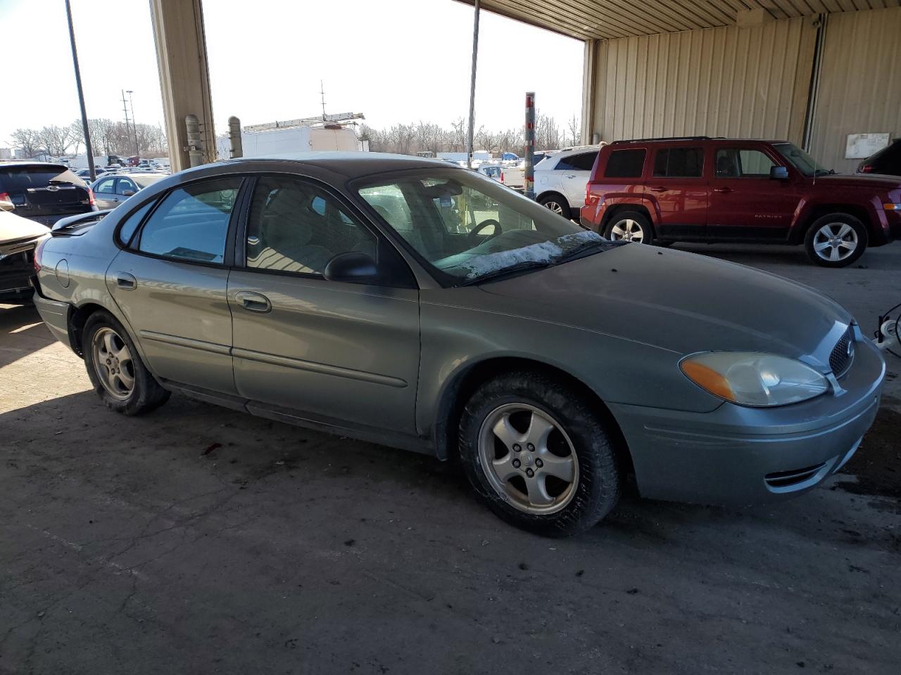 2005 Ford Taurus VIN 1FAFP53255A203327 Copart auction photo, rear end / side damage thumbnail 4