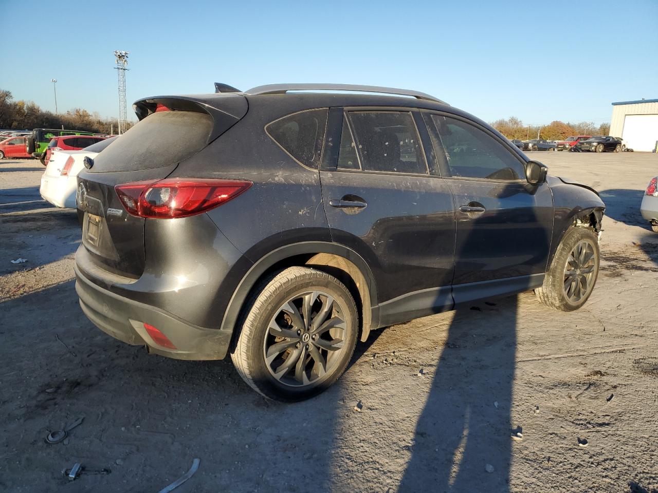 2016 Mazda CX-5 VIN JM3KE2DY5G0621094 Copart auction photo, front end / minor dent/scratches damage thumbnail 3