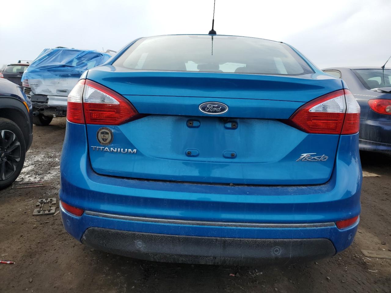 2014 Ford Fiesta VIN 3FADP4CJ3EM235088 Copart auction photo, front end / side damage thumbnail 6