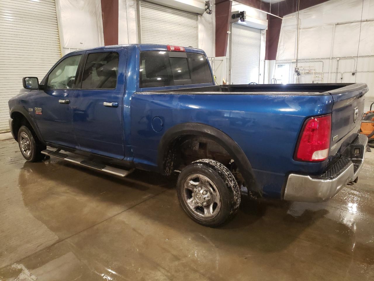 2011 Dodge RAM VIN 3D7TT2CT9BG593223 Copart auction photo, mechanical / rear end damage thumbnail 2