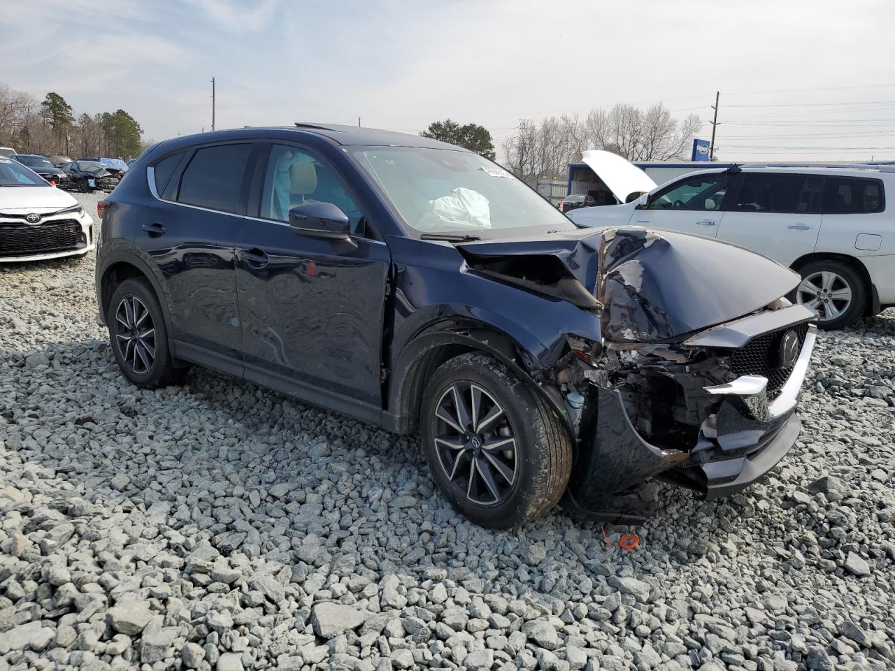 2018 Mazda CX-5 VIN JM3KFBDM3J0301080 Copart auction photo, front end / side damage thumbnail 4