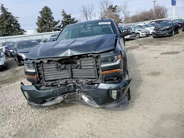 2018 Chevrolet Silverado VIN 3GCUKREC1JG267423 Copart auction photo, front end / minor dent/scratches damage thumbnail 11