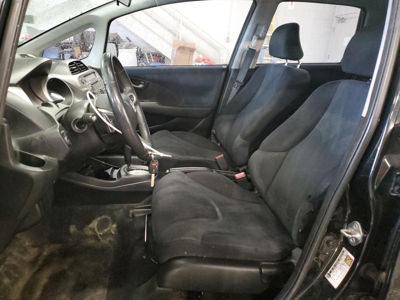 2009 Honda Fit VIN JHMGE88489S060839 Copart auction photo, rear end / side damage thumbnail 7