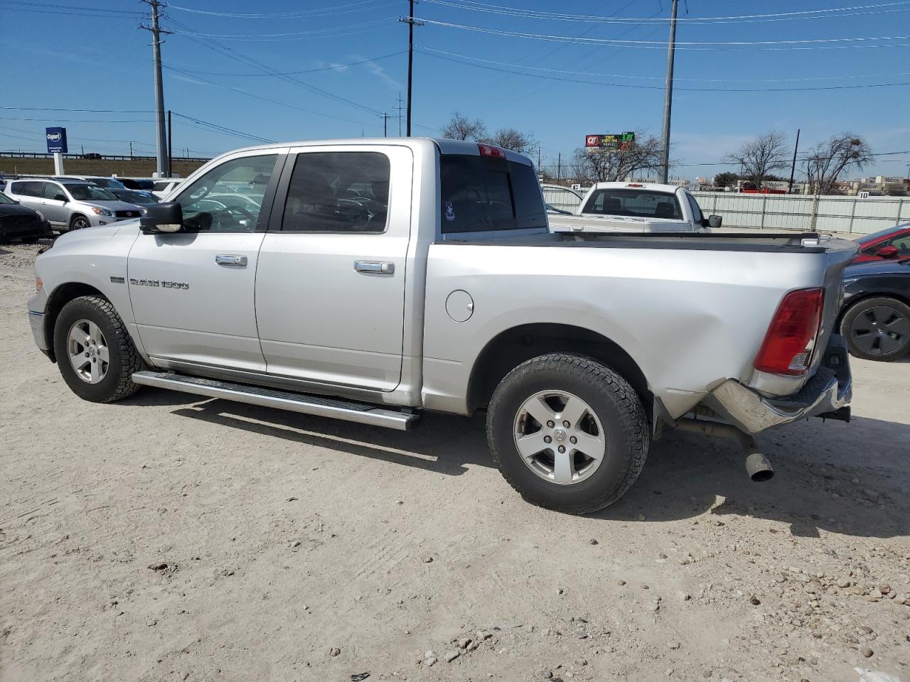 2011 Dodge RAM VIN 1D7RB1CTXBS663697 Copart auction photo, rear end damage thumbnail 2