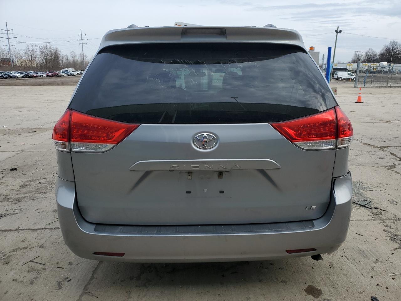 2014 Toyota Sienna VIN 5TDKK3DC1ES473337 Copart auction photo, side / rear end damage thumbnail 6