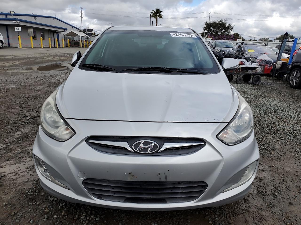 2013 Hyundai Accent VIN KMHCU5AE4DU105627 Copart auction photo, all over damage thumbnail 5