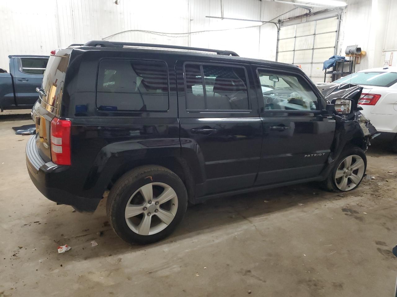 2015 Jeep Liberty (Patriot) VIN 1C4NJRFB3FD303081 Copart auction photo, front end damage thumbnail 3