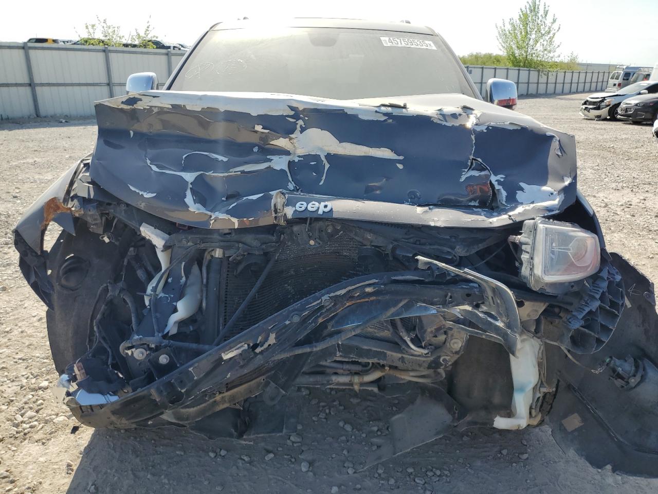 2015 Jeep Grand Cherokee VIN 1C4RJFBG7FC229784 Copart auction photo, front end / hail damage thumbnail 5