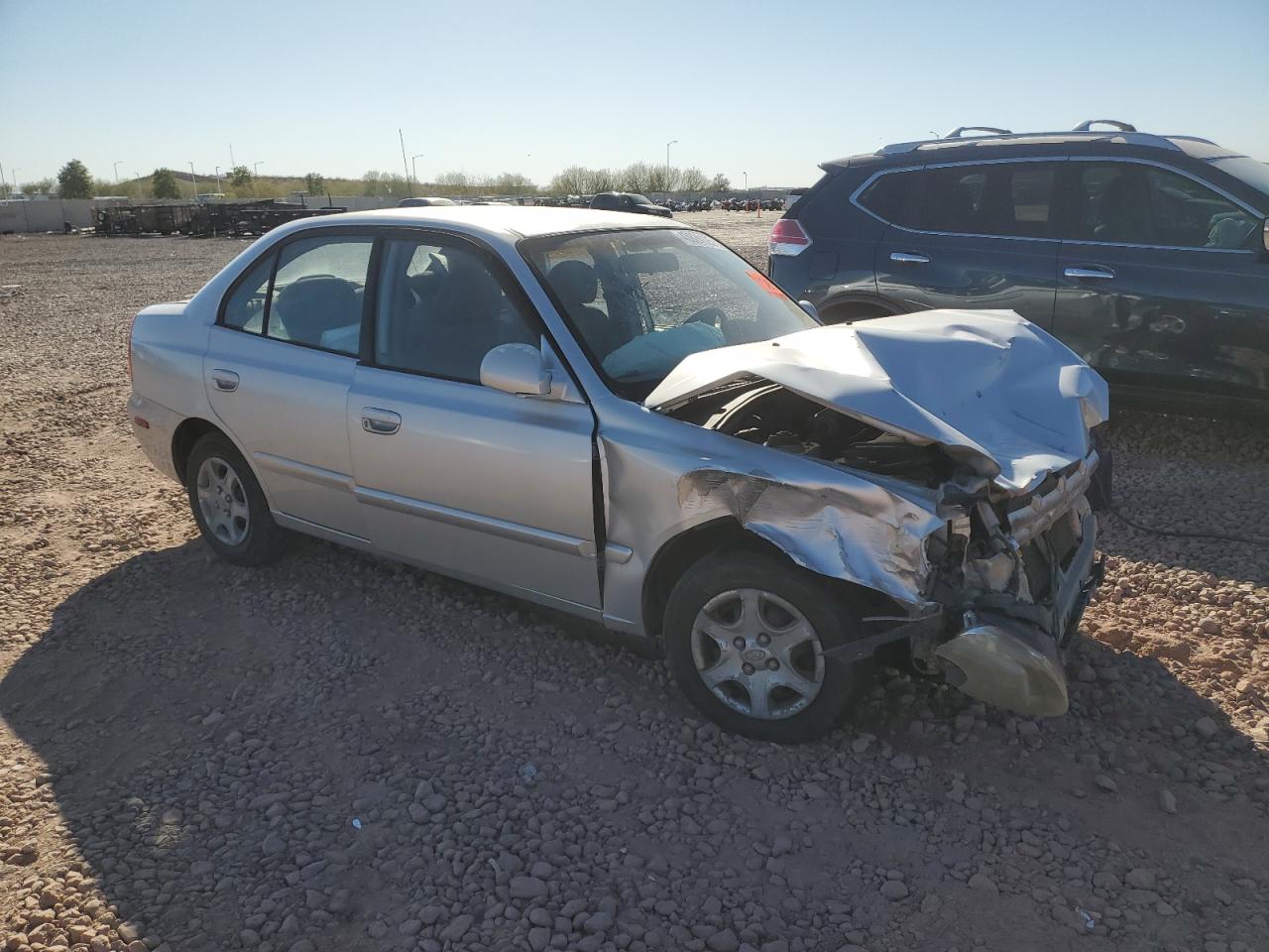 2003 Hyundai Accent VIN KMHCG45CX3U429660 Copart auction photo, front end / side damage thumbnail 4