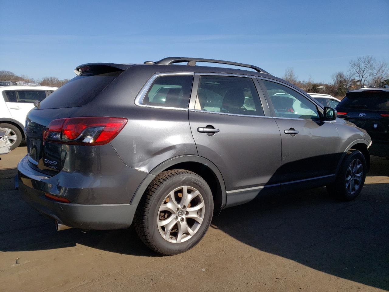 2015 Mazda CX-9 VIN JM3TB3CVXF0458578 Copart auction photo, front end / minor dent/scratches damage thumbnail 3