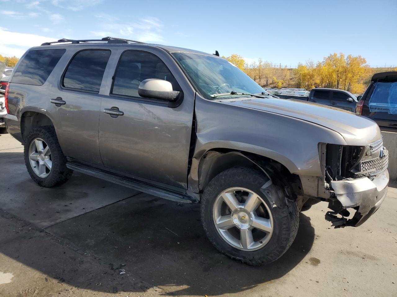 2011 Chevrolet Tahoe VIN 1GNSKBE02BR317131 Copart auction photo, front end / side damage thumbnail 4