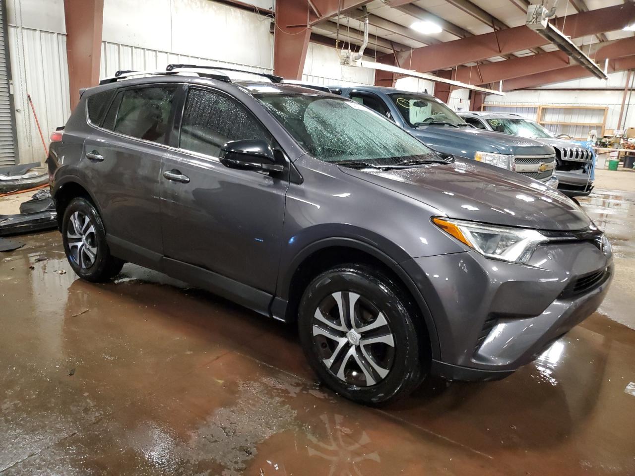 2016 Toyota RAV 4 VIN 2T3ZFREV7GW310652 Copart auction photo, rear end / side damage thumbnail 4