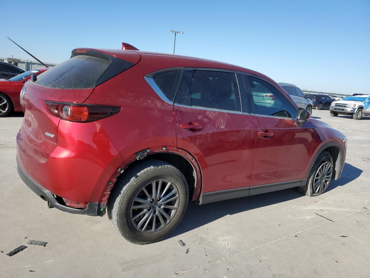 2018 Mazda CX-5 VIN JM3KFABMXJ1401121 Copart auction photo, side / all over damage thumbnail 3
