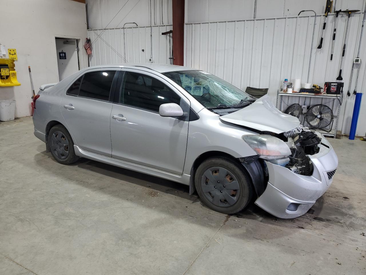 2009 Toyota Yaris VIN JTDBT903491305992 Copart auction photo, front end damage thumbnail 4