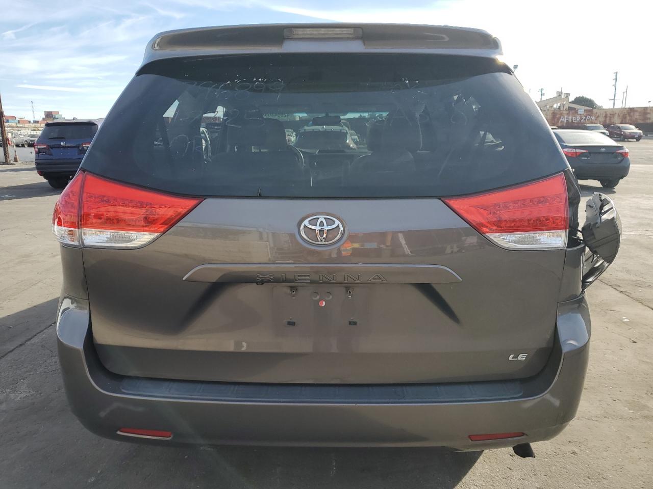 2014 Toyota Sienna VIN 5TDKK3DC2ES457616 Copart auction photo, all over / undercarriage damage thumbnail 6