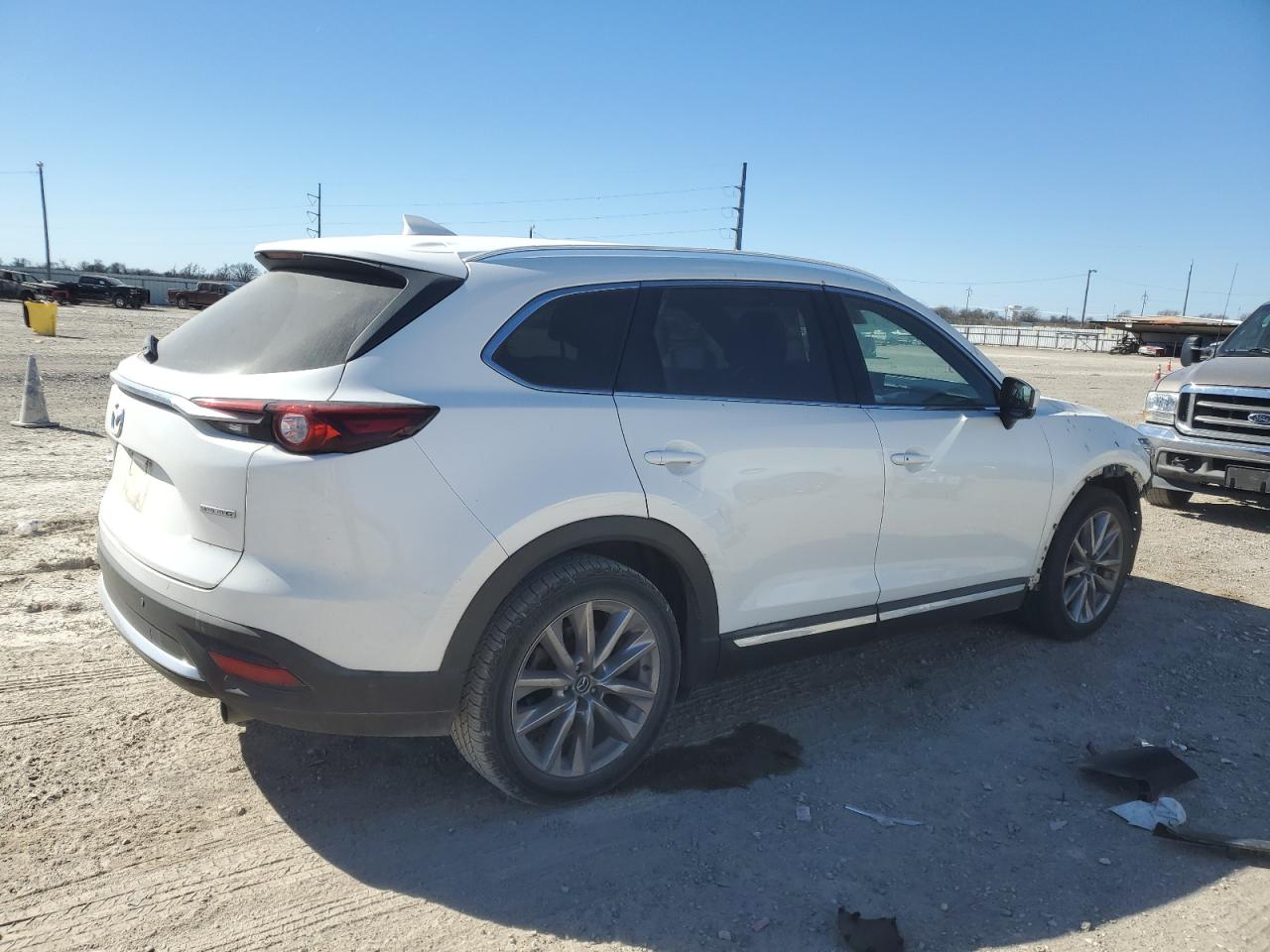2021 Mazda CX-9 VIN JM3TCADYXM0507401 Copart auction photo, front end / side damage thumbnail 3