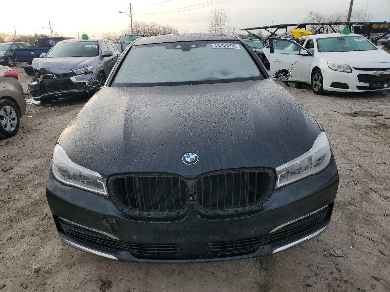 2016 BMW 7er VIN WBA7F2C51GG415164 Copart auction photo, side / front end damage thumbnail 5