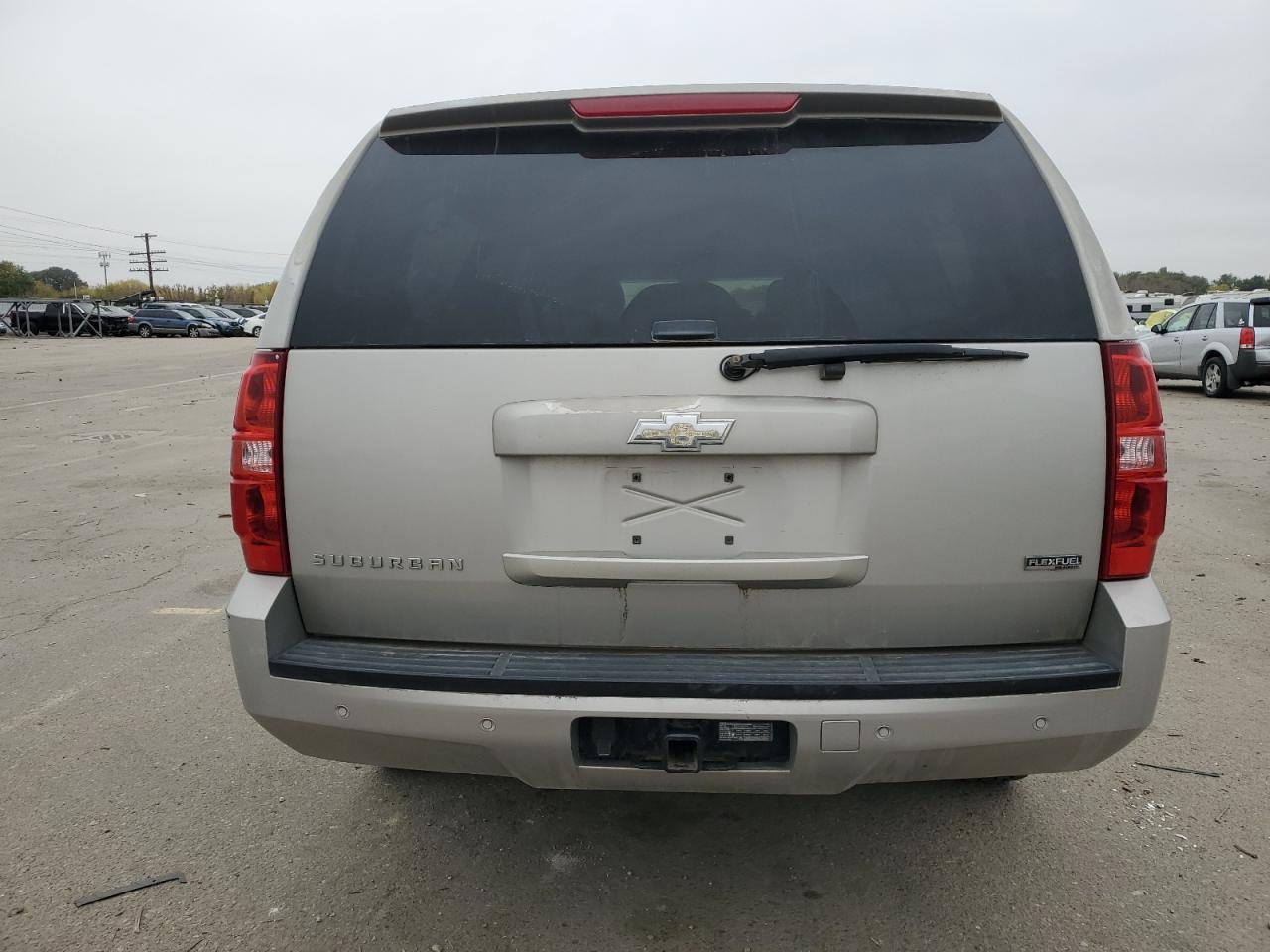 2009 Chevrolet Suburban VIN 1GNFK26349R255803 Copart auction photo, front end / side damage thumbnail 6