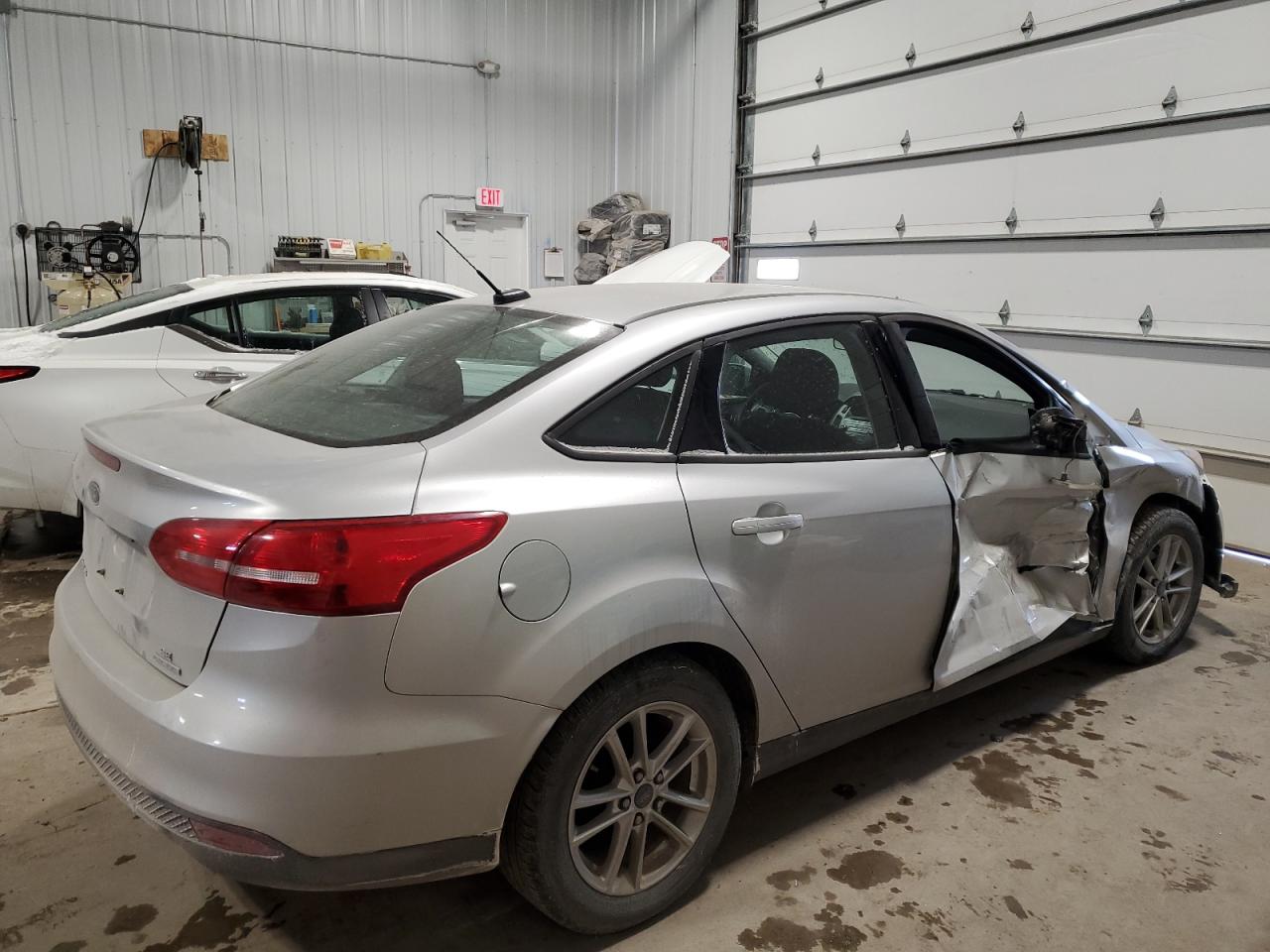 2015 Ford Focus VIN 1FADP3F27FL205660 Copart auction photo, side damage thumbnail 3