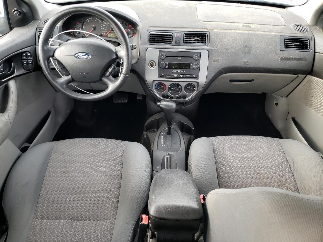 2005 Ford Focus VIN 3FAFP37N65R156999 Copart auction photo, rear end / hail damage thumbnail 8