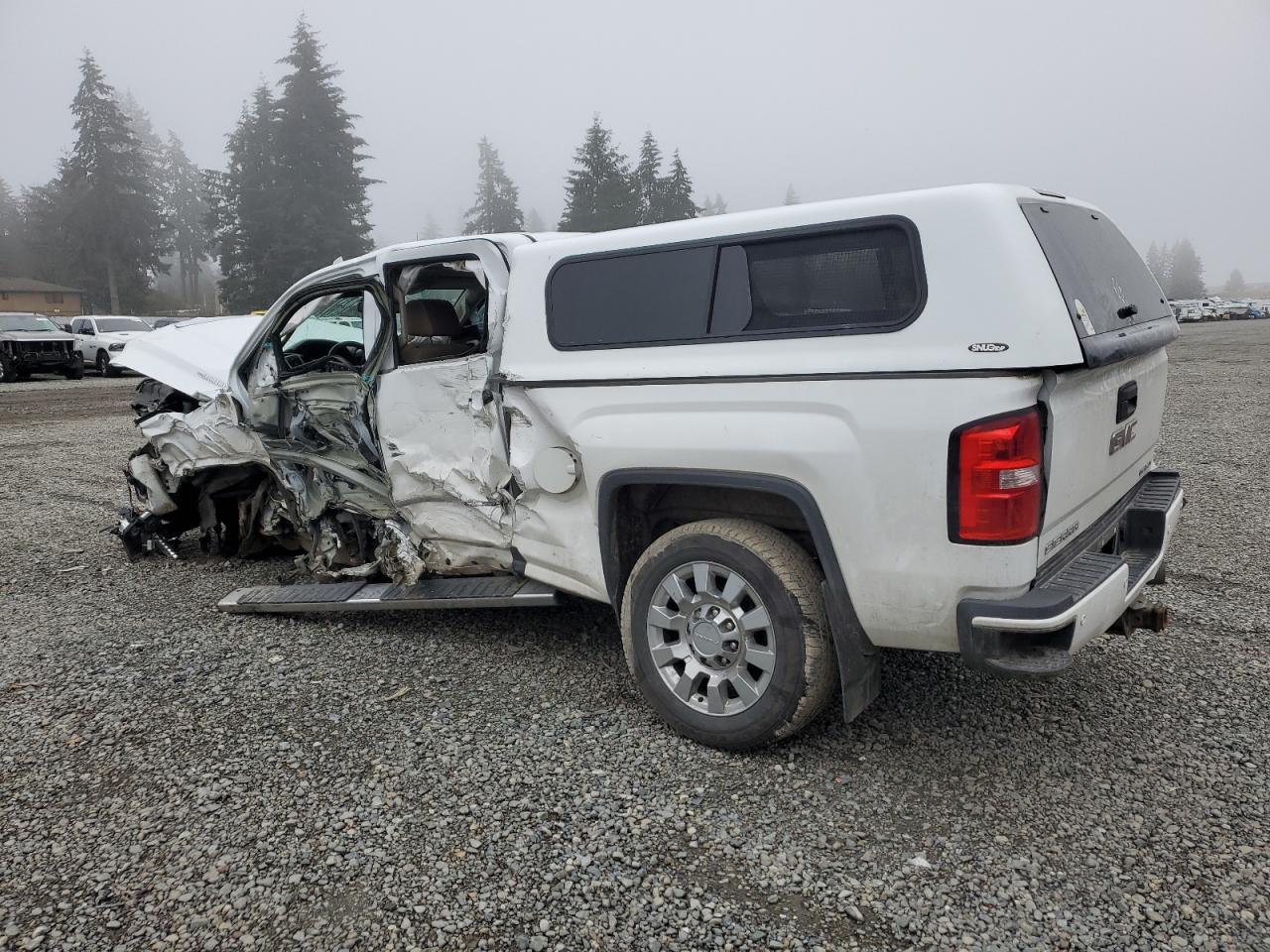 2017 GMC Sierra VIN 1GT12UEY5HF222224 Copart auction photo, side / front end damage thumbnail 2
