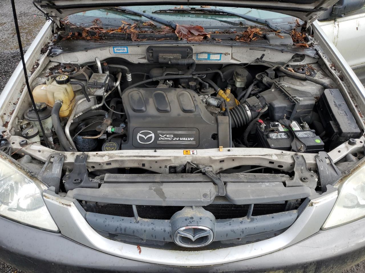 2004 Mazda Tribute VIN 4F2CZ96174KM22543 Copart auction photo, side damage thumbnail 12