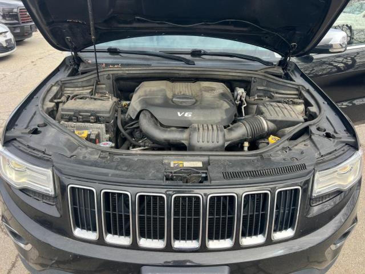 2015 Jeep Grand Cherokee VIN 1C4RJFBG3FC827628 Copart auction photo, minor dent/scratches / normal wear damage thumbnail 7