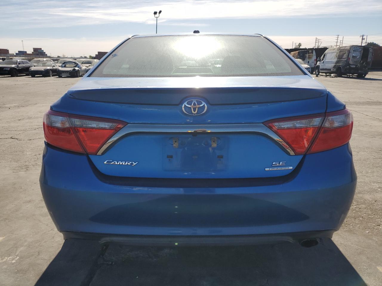 2016 Toyota Camry VIN 4T1BF1FK1GU501080 Copart auction photo, side / rear end damage thumbnail 6
