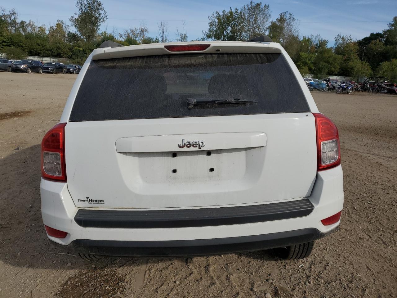 2012 Jeep Compass VIN 1C4NJCBB5CD634744 Copart auction photo, side / minor dent/scratches damage thumbnail 6
