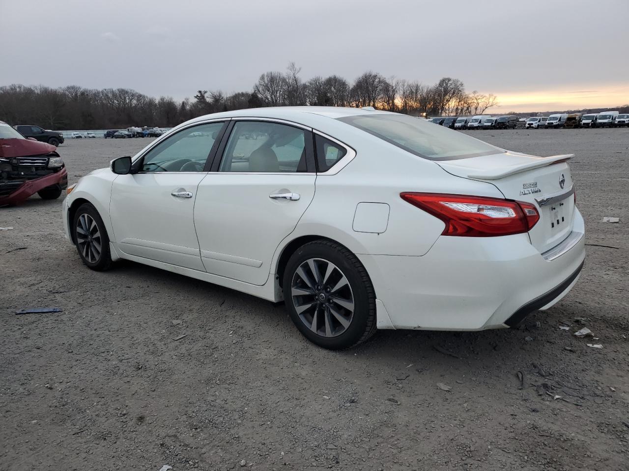 2016 Nissan Altima VIN 1N4AL3AP9GC295476 Copart auction photo, side / front end damage thumbnail 2