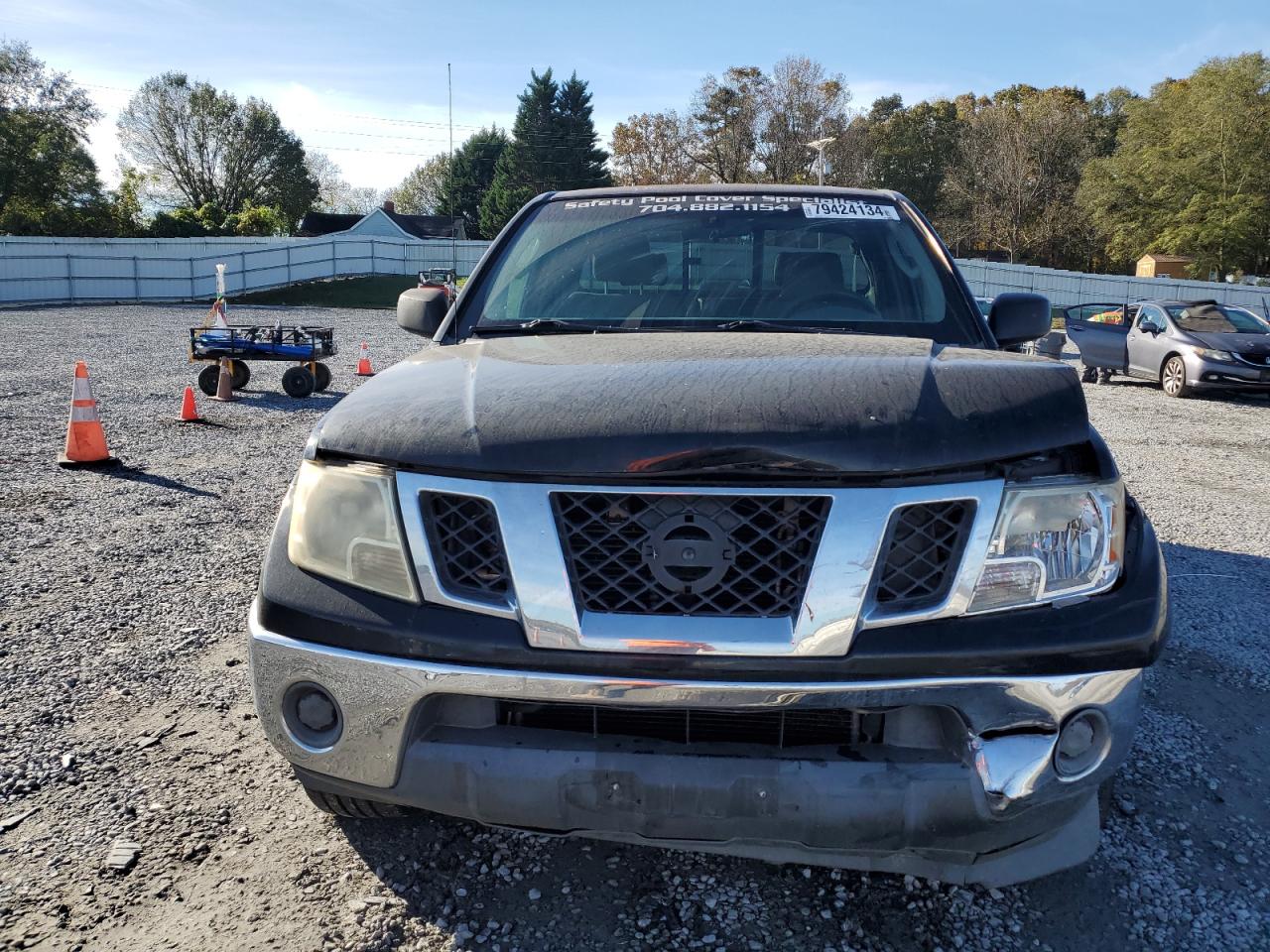 2009 Nissan Navara (Frontier) VIN 1N6BD06T19C412175 Copart auction photo, front end / side damage thumbnail 5