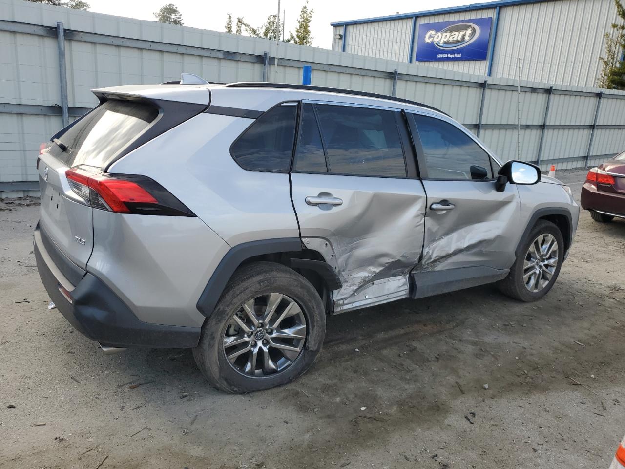 2020 Toyota RAV 4 VIN 2T3C1RFV5LW059918 Copart auction photo, side damage thumbnail 3