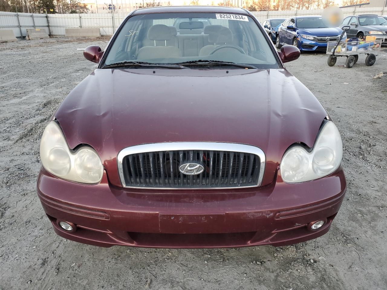 2002 Hyundai Sonata VIN KMHWF25S92A594191 Copart auction photo, minor dent/scratches damage thumbnail 5