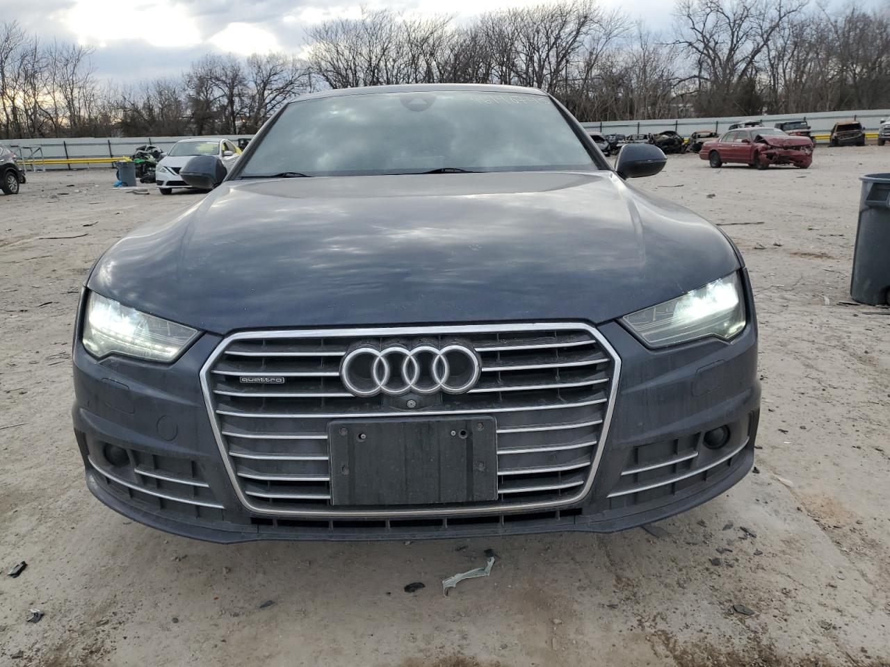 2016 Audi A7 VIN WAU2GAFCXGN153877 Copart auction photo, rear end / minor dent/scratches damage thumbnail 5