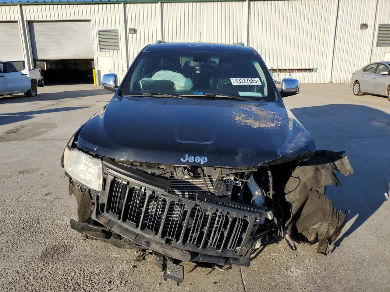 2012 Jeep Grand Cherokee VIN 1C4RJFBT6CC346961 Copart auction photo, front end damage thumbnail 5