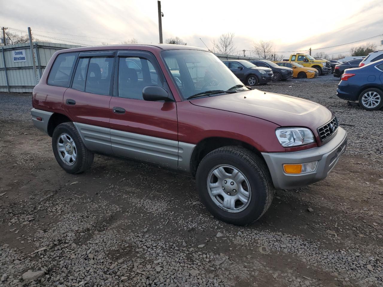 2000 Toyota RAV 4 VIN JT3HP10V0Y7170687 Copart auction photo, undercarriage / side damage thumbnail 4