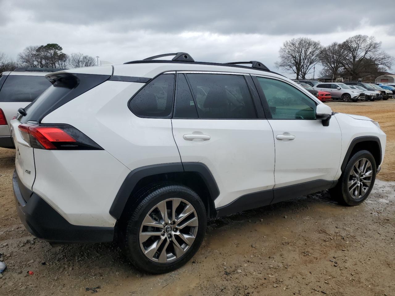2020 Toyota RAV 4 VIN 2T3C1RFV9LW058982 Copart auction photo, side damage thumbnail 3