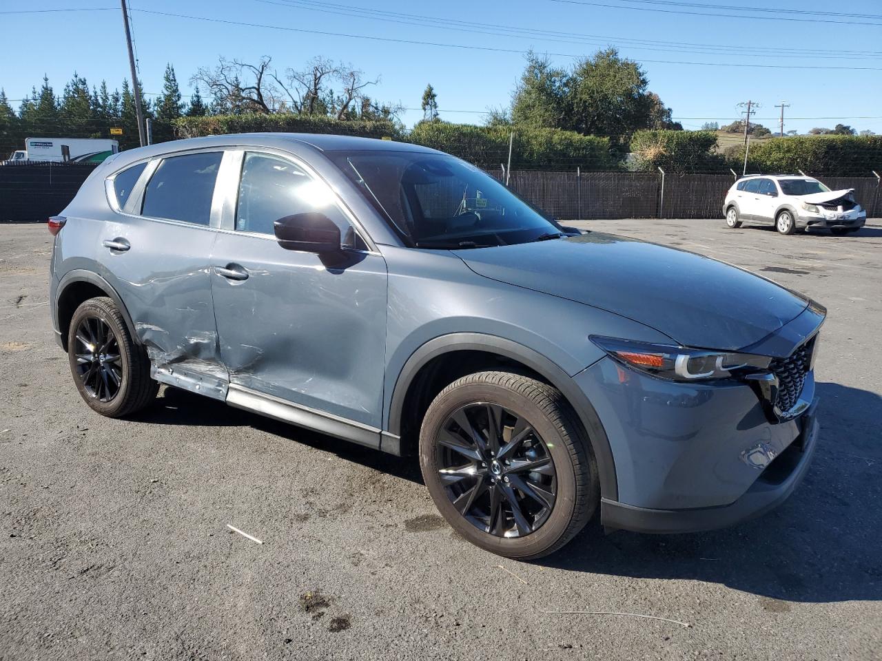 2023 Mazda CX-5 VIN JM3KFBCM6P0266593 Copart auction photo, side / front end damage thumbnail 4