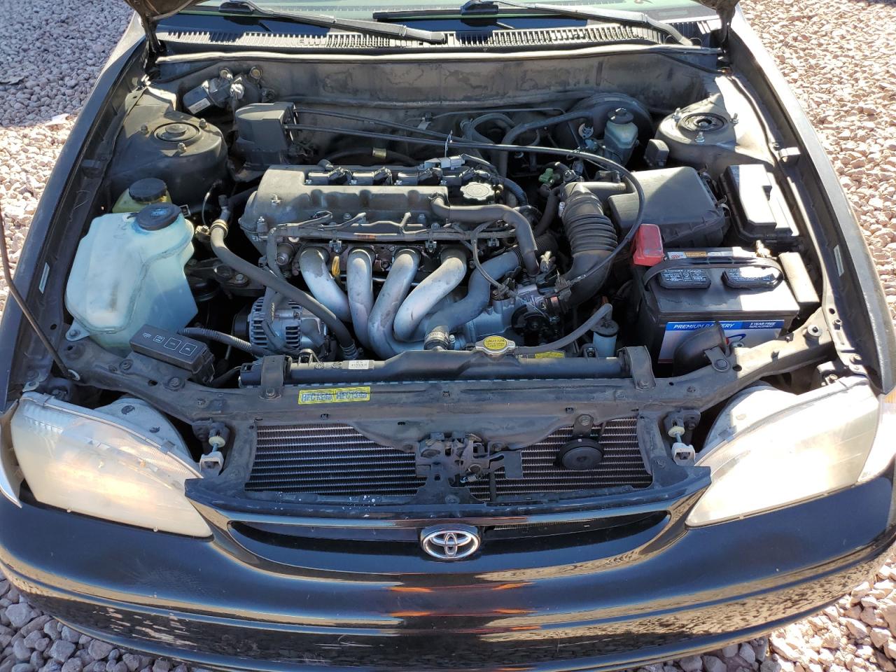 2000 Toyota Corolla VIN 1NXBR12E5YZ358174 Copart auction photo, front end / side damage thumbnail 12