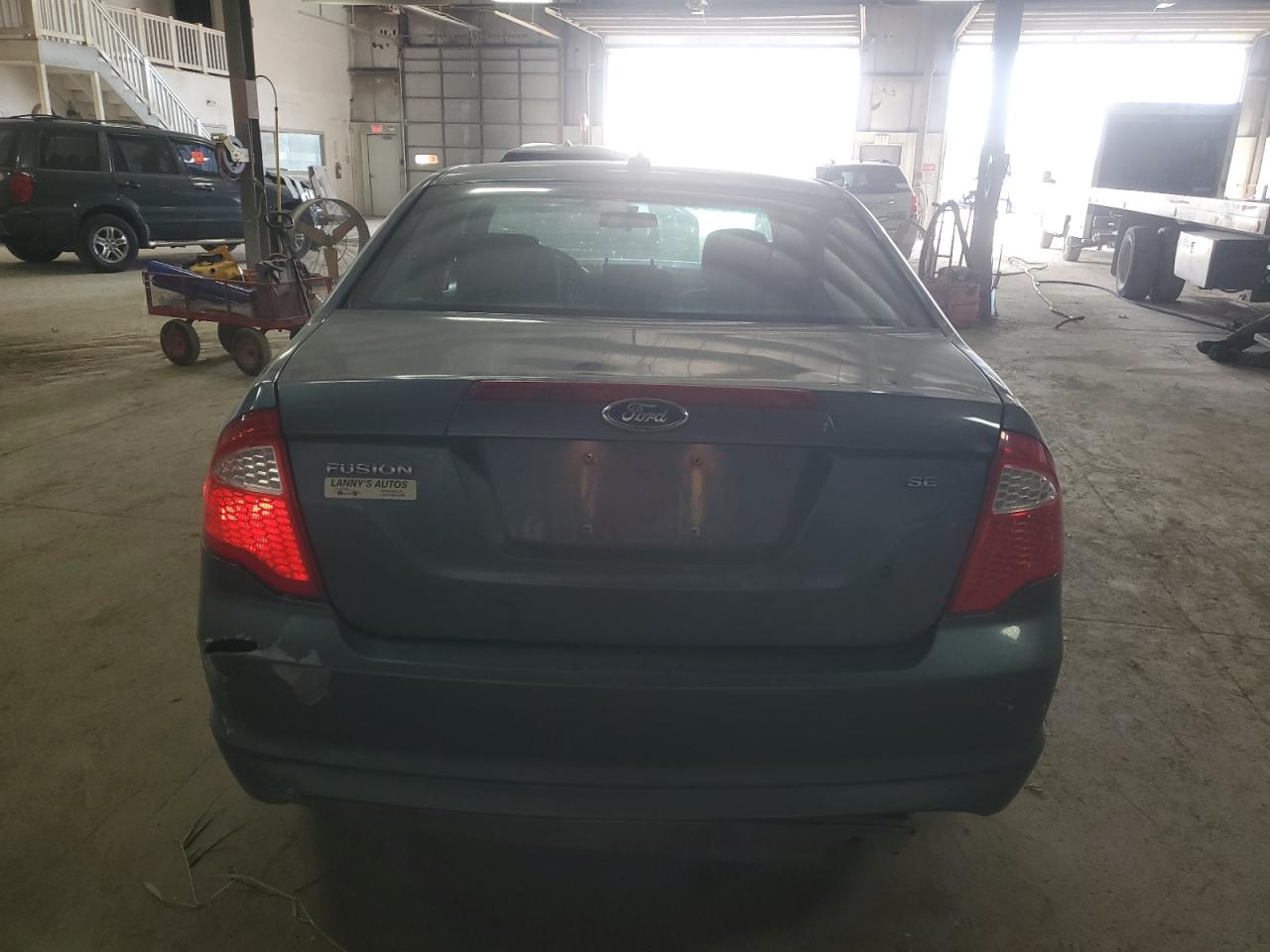 2012 Ford Fusion VIN 3FAHP0HA4CR233210 Copart auction photo, front end / side damage thumbnail 6