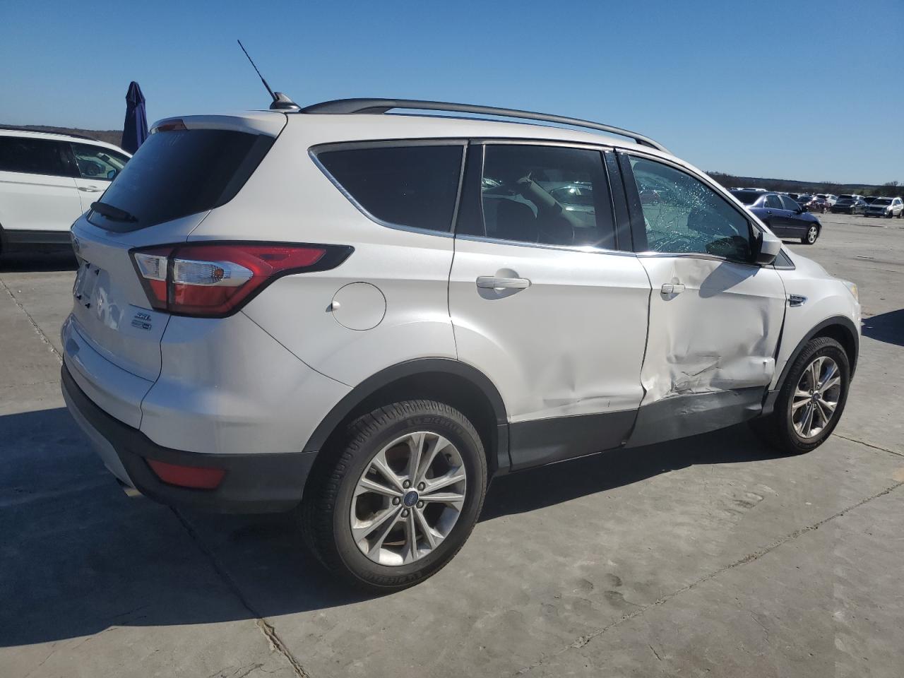2018 Ford Escape VIN 1FMCU9HD9JUB54211 Copart auction photo, side / front end damage thumbnail 3