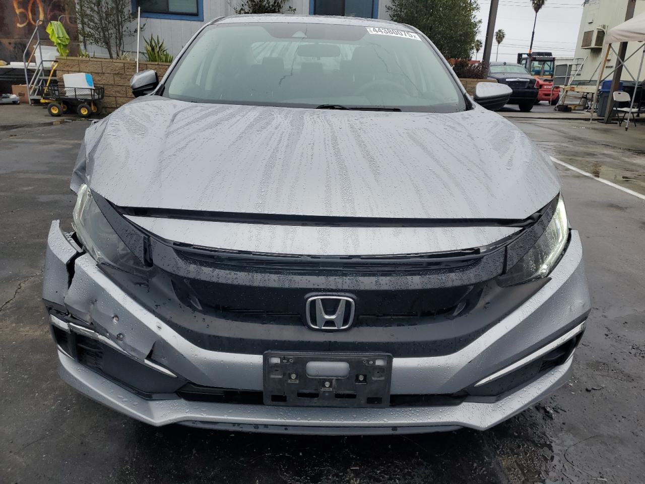 2020 Honda Civic VIN 19XFC2F60LE200672 Copart auction photo, front end / side damage thumbnail 5