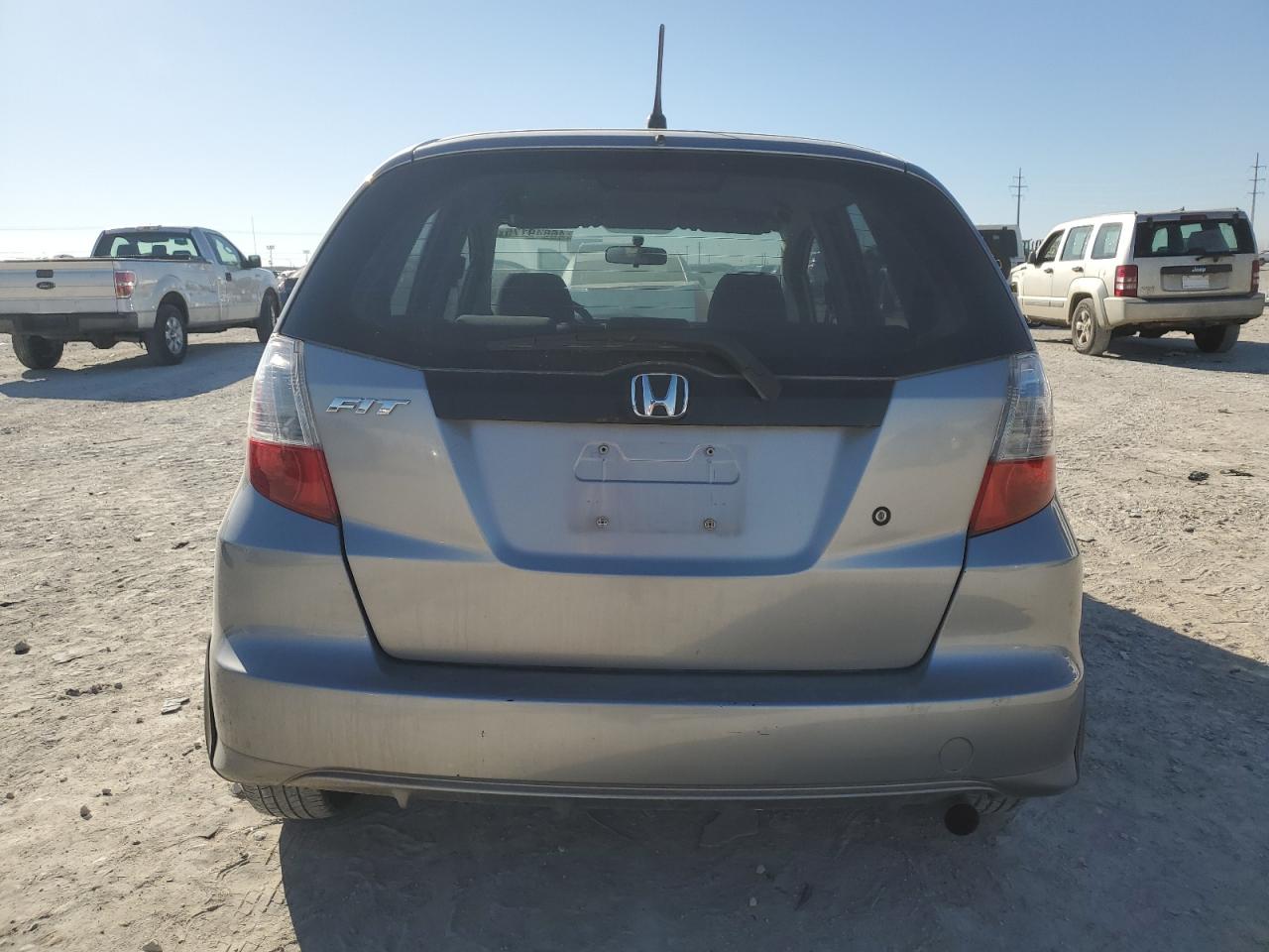 2010 Honda Fit VIN JHMGE8H28AC006356 Copart auction photo, front end / minor dent/scratches damage thumbnail 6