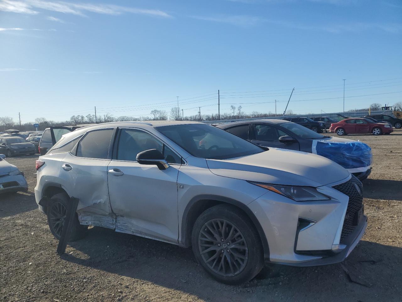 2016 Lexus RX VIN 2T2BZMCA8GC036427 Copart auction photo, side / undercarriage damage thumbnail 4