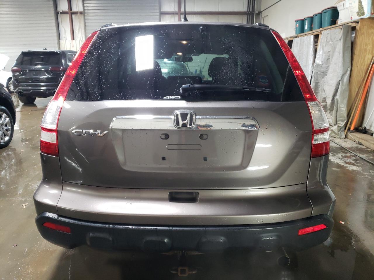 2009 Honda CR-V VIN 3CZRE48599G706161 Copart auction photo, side / rear end damage thumbnail 6