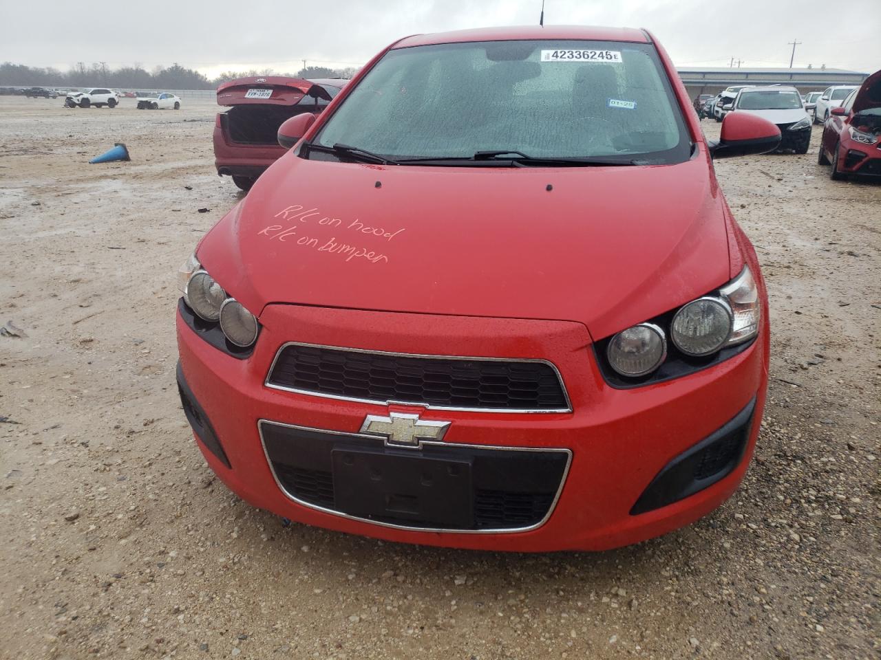 2012 Chevrolet Sonic VIN 1G1JC5SH9C4108070 Copart auction photo, side / minor dent/scratches damage thumbnail 5
